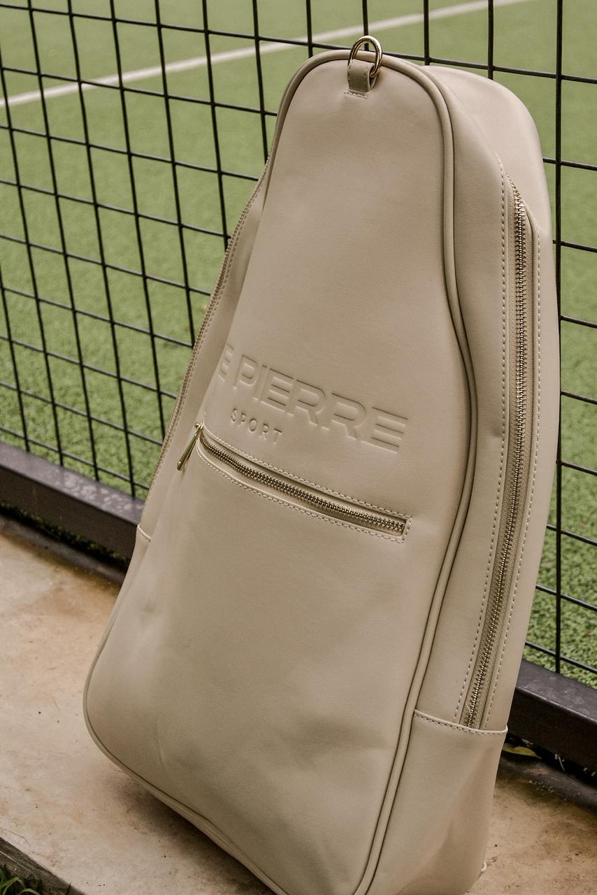 Le Pierre Sport padel bag standing near the court fence