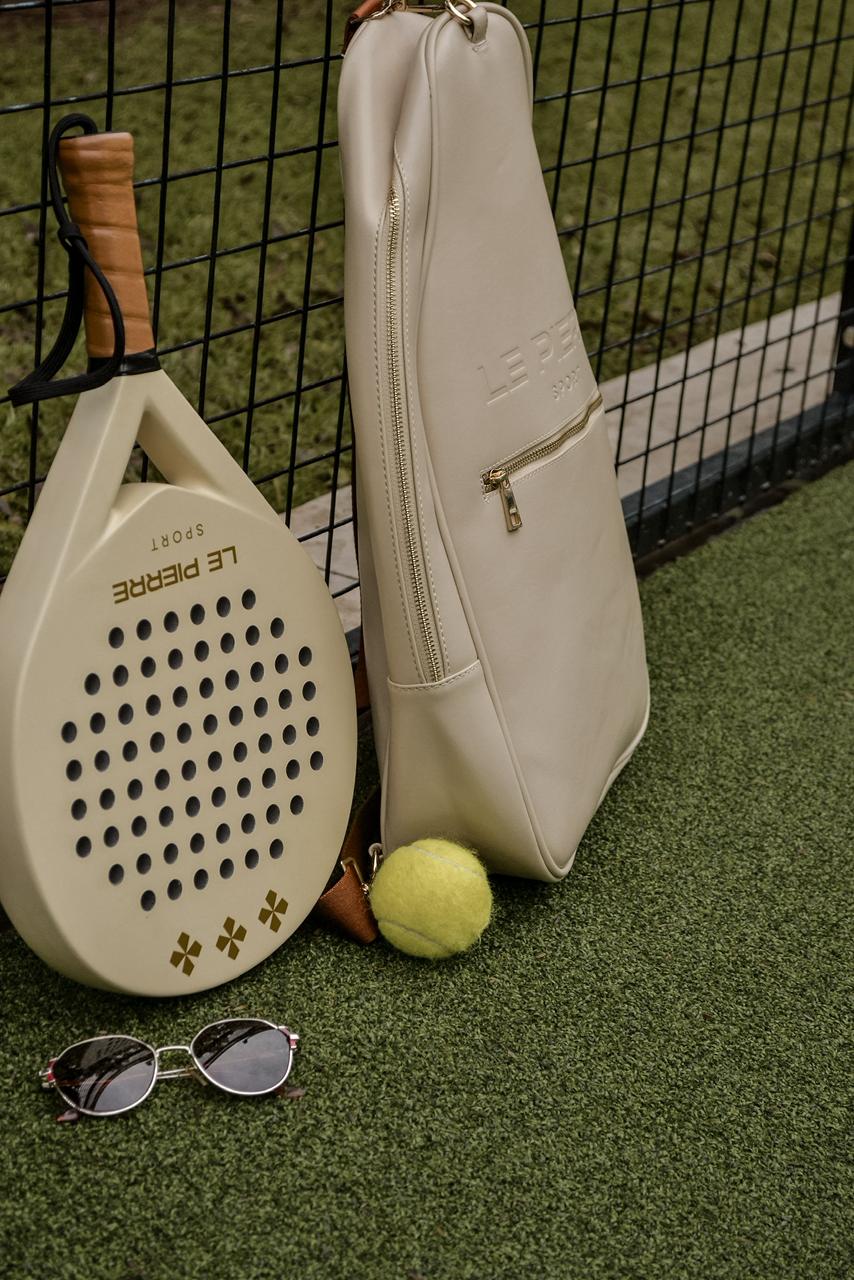 Le Pierre Sport bag displayed with racket and ball